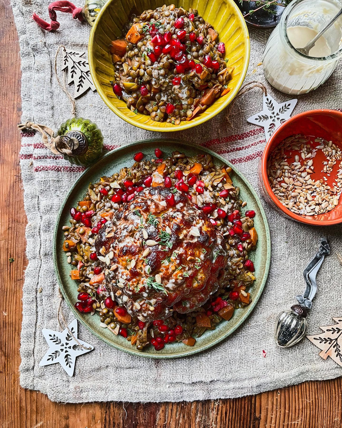 Served on a bed of earthy, super tasty puy lentils then topped with creamy tahini dressing and little pops of gem like pomegranate seeds for an extra festive feel.