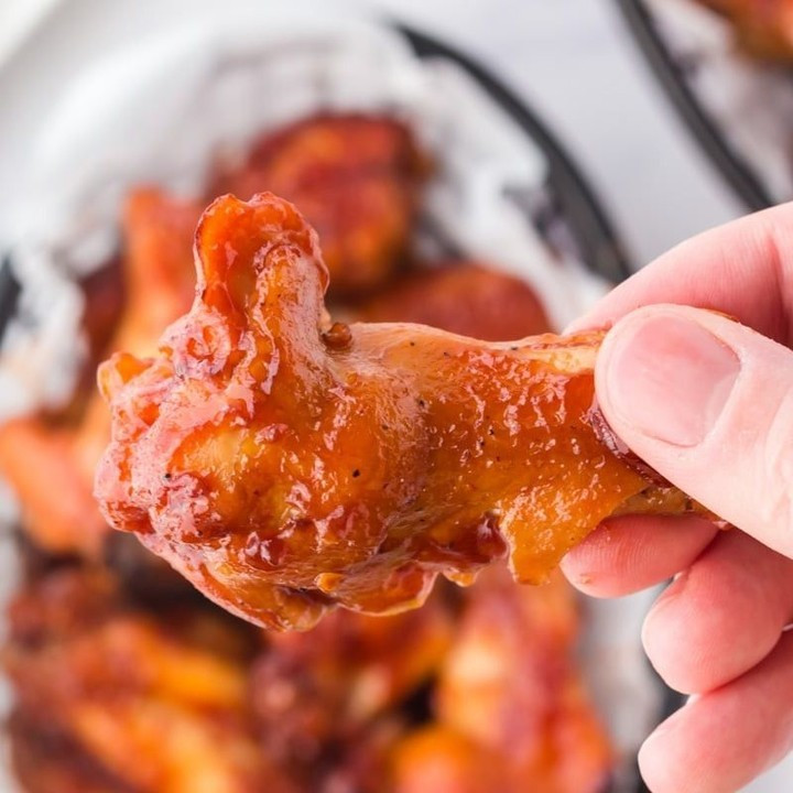 Slow Cooker Chicken Wings are fall off the bone delicious. A quick broil gives you the best of both worlds – crispy on the outside, tender and juicy on the inside!⁠
⁠