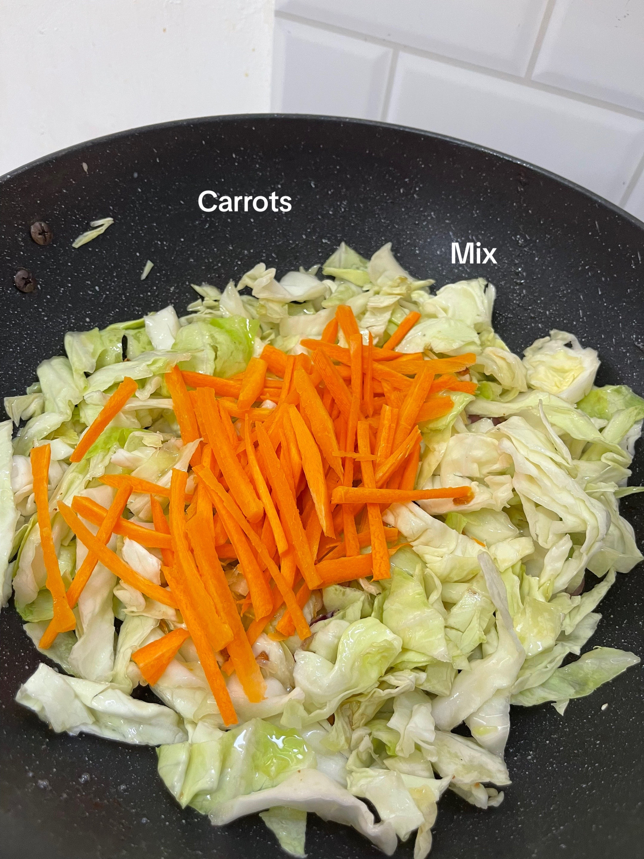 stir fry cabbage & carrots with quail eggs