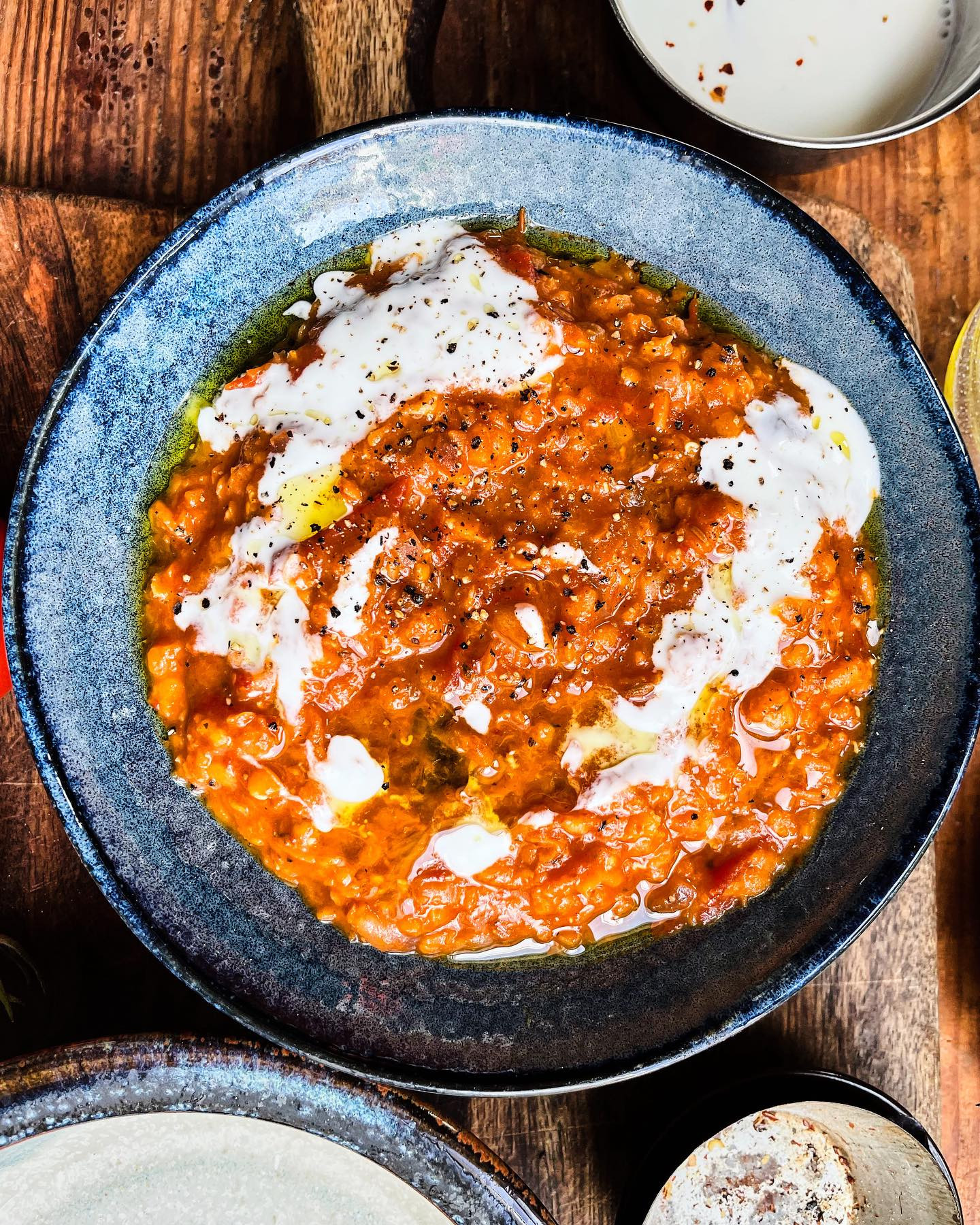 The tomatoes, charred to perfection, whispered of sunlit gardens, while the lentils, earthy and comforting, spoke of nourishing simplicity