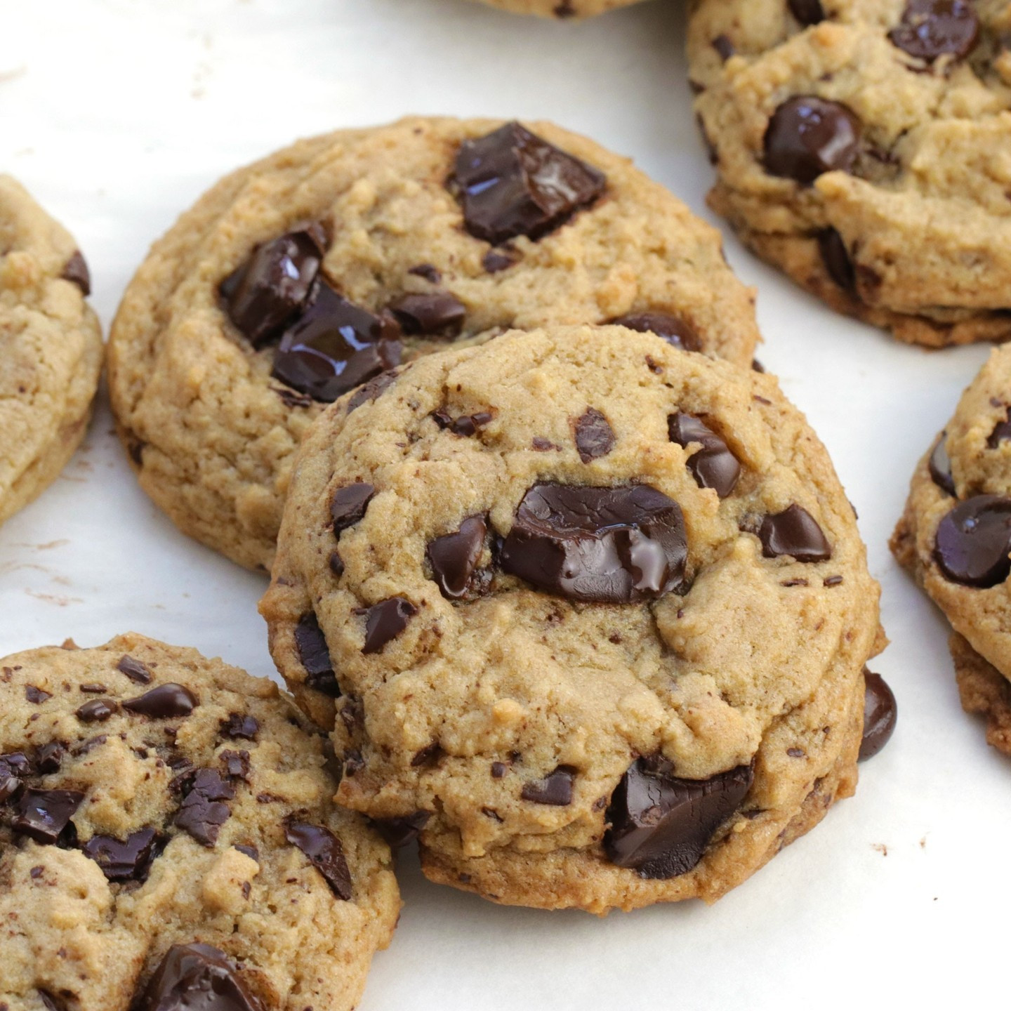 These are hands down the best vegan chocolate chip cookies you will ever make! They are crispy on the outside, and perfectly chewy! They are sweet (but not too sweet), buttery, and oozing with melty chocolate.