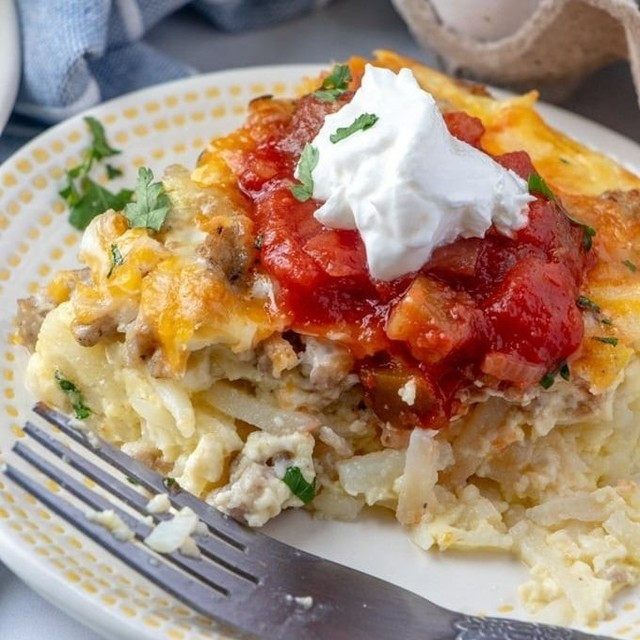 Wake up to a delicious brunch with this fluffy and flavorful Sausage & Egg Casserole. It's packed with sausage, cheese, and potatoes, and you can even prep it the night before!⁠