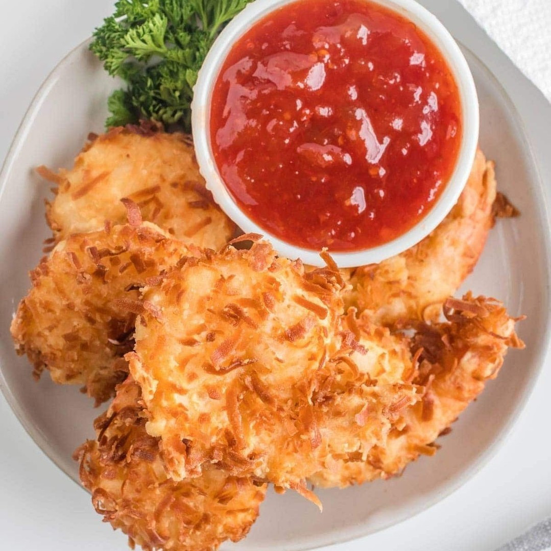 Coconut shrimp are crispy, golden, and slightly sweet. This easy finger food is perfect for any party and completely irresistible when served with my 3-ingredient dipping sauce.⁠