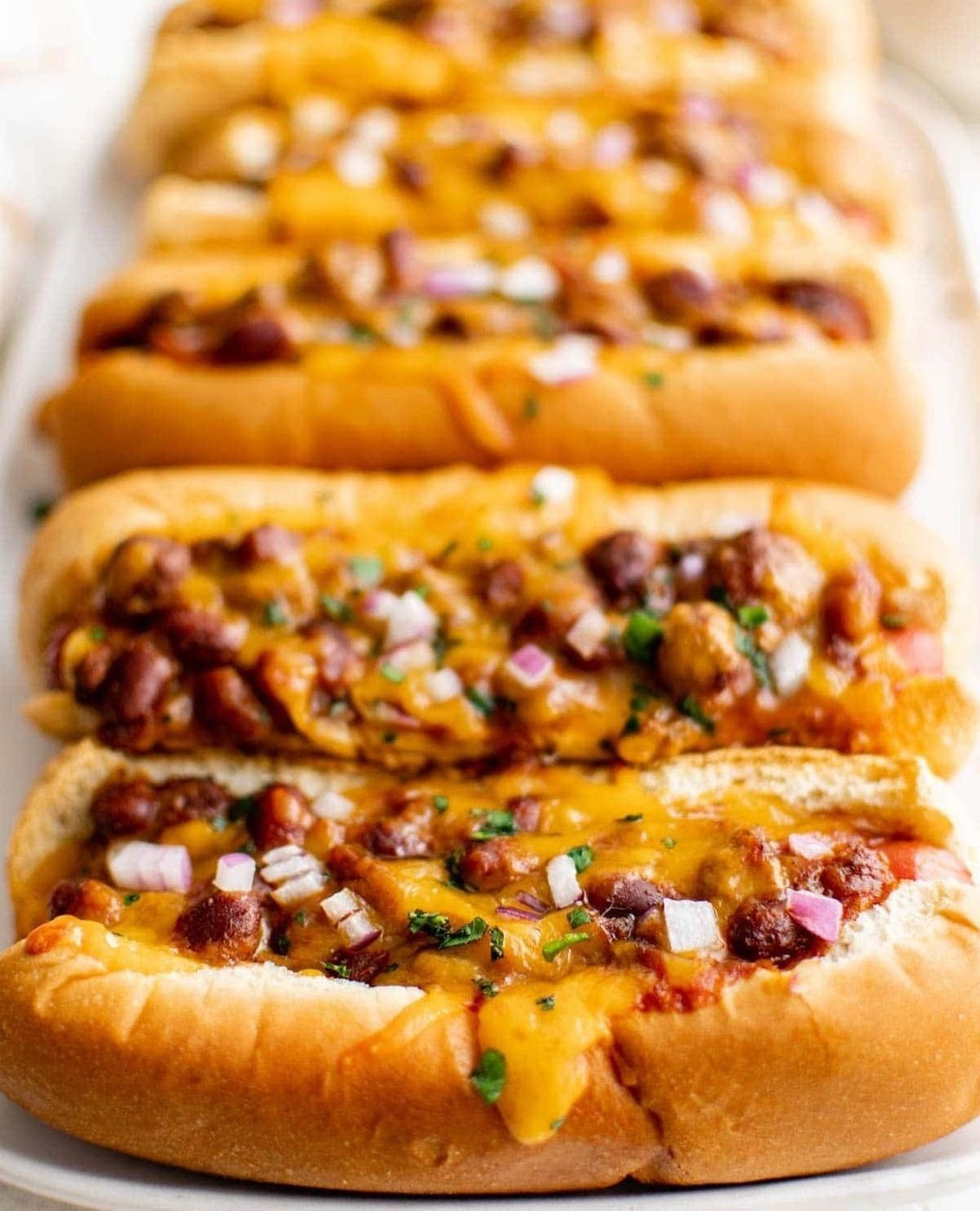 BAKED CHILI CHEESE DOGS⁠