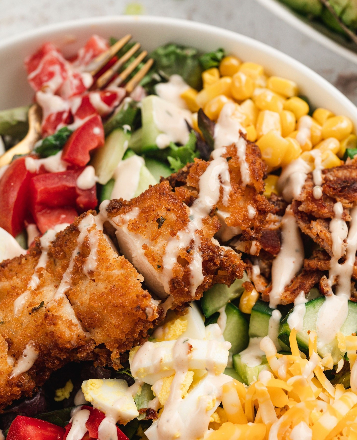 This Crispy Chicken Salad is hearty, delicious, and absolutely loaded! It has crispy frie