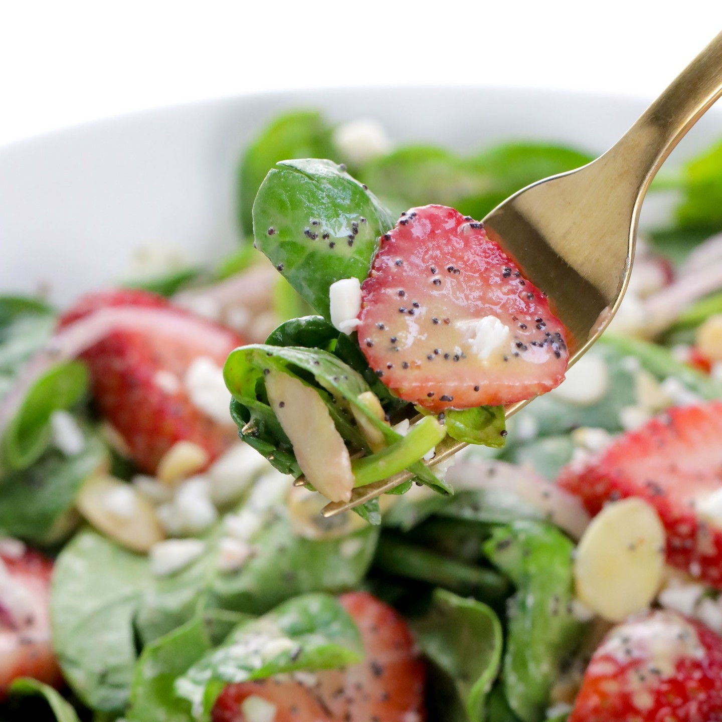 This Vegan Strawberry Spinach Salad is the ultimate summer salad, coming together in just