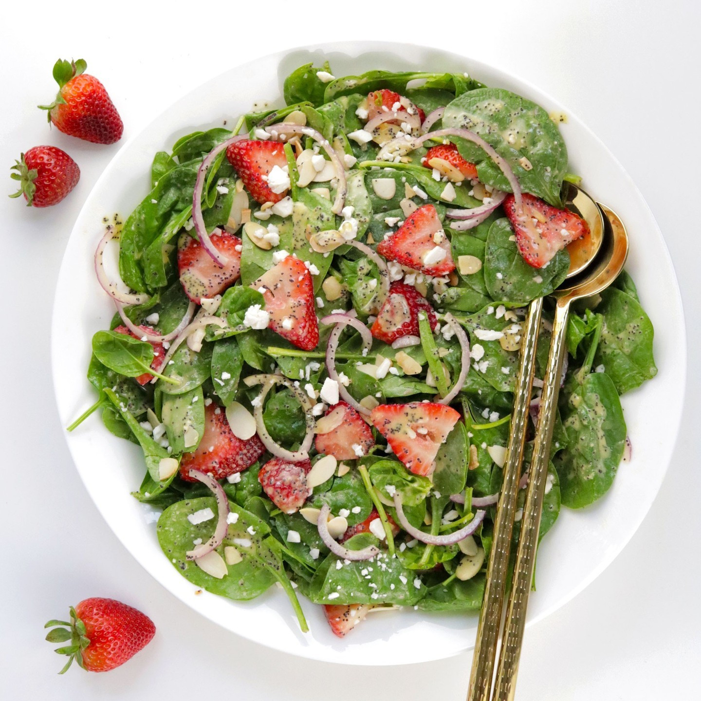 This Vegan Strawberry Spinach Salad is the ultimate summer salad, coming together in just