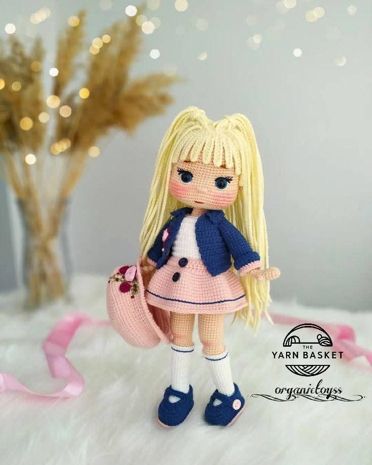 Charming Crochet Doll Pattern with Pink Outfit and Hat