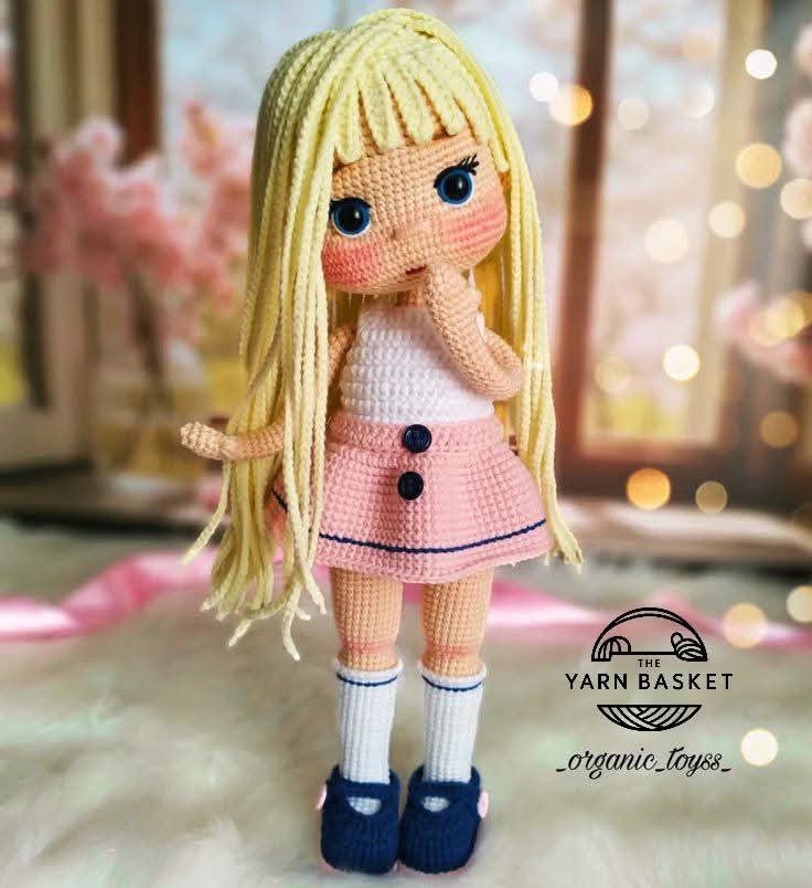 Charming Crochet Doll Pattern with Pink Outfit and Hat