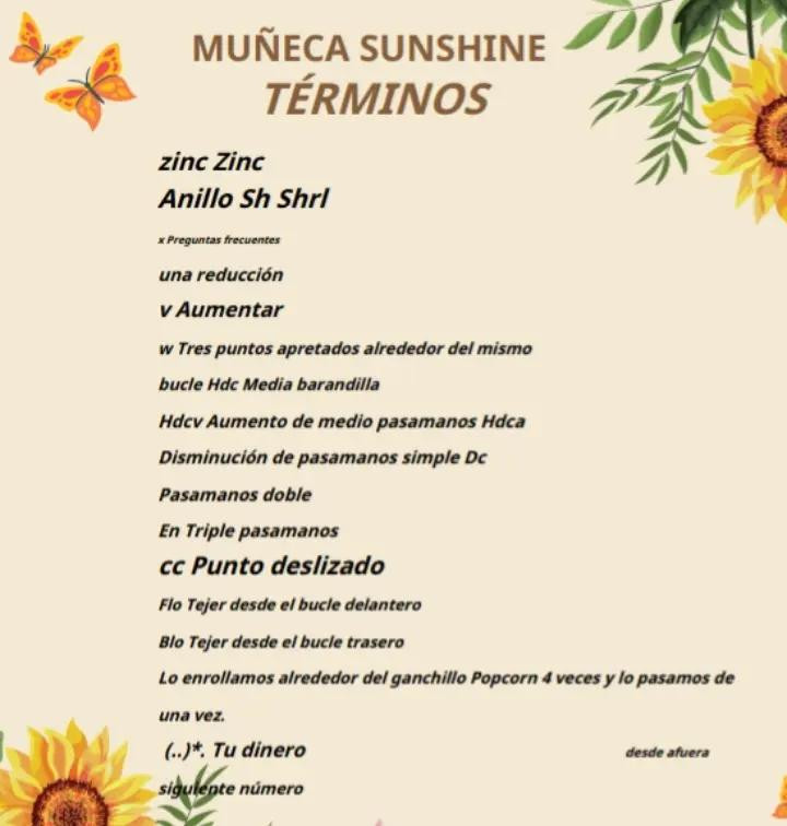 Muñeca de crochet con vestido blanco adornado con girasoles amarillos