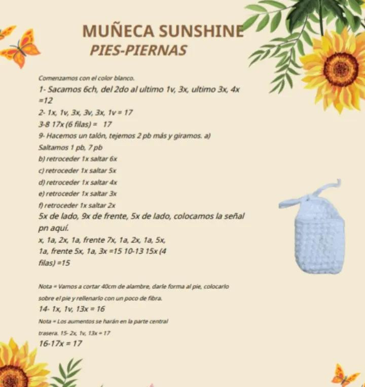 Muñeca de crochet con vestido blanco adornado con girasoles amarillos