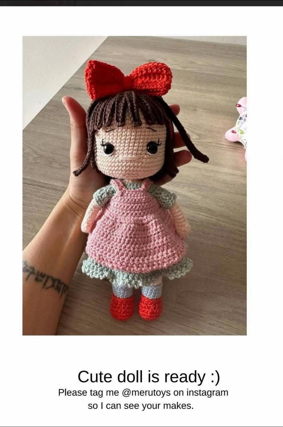 Adorable Crochet Doll with Red Bow and Pink Dress