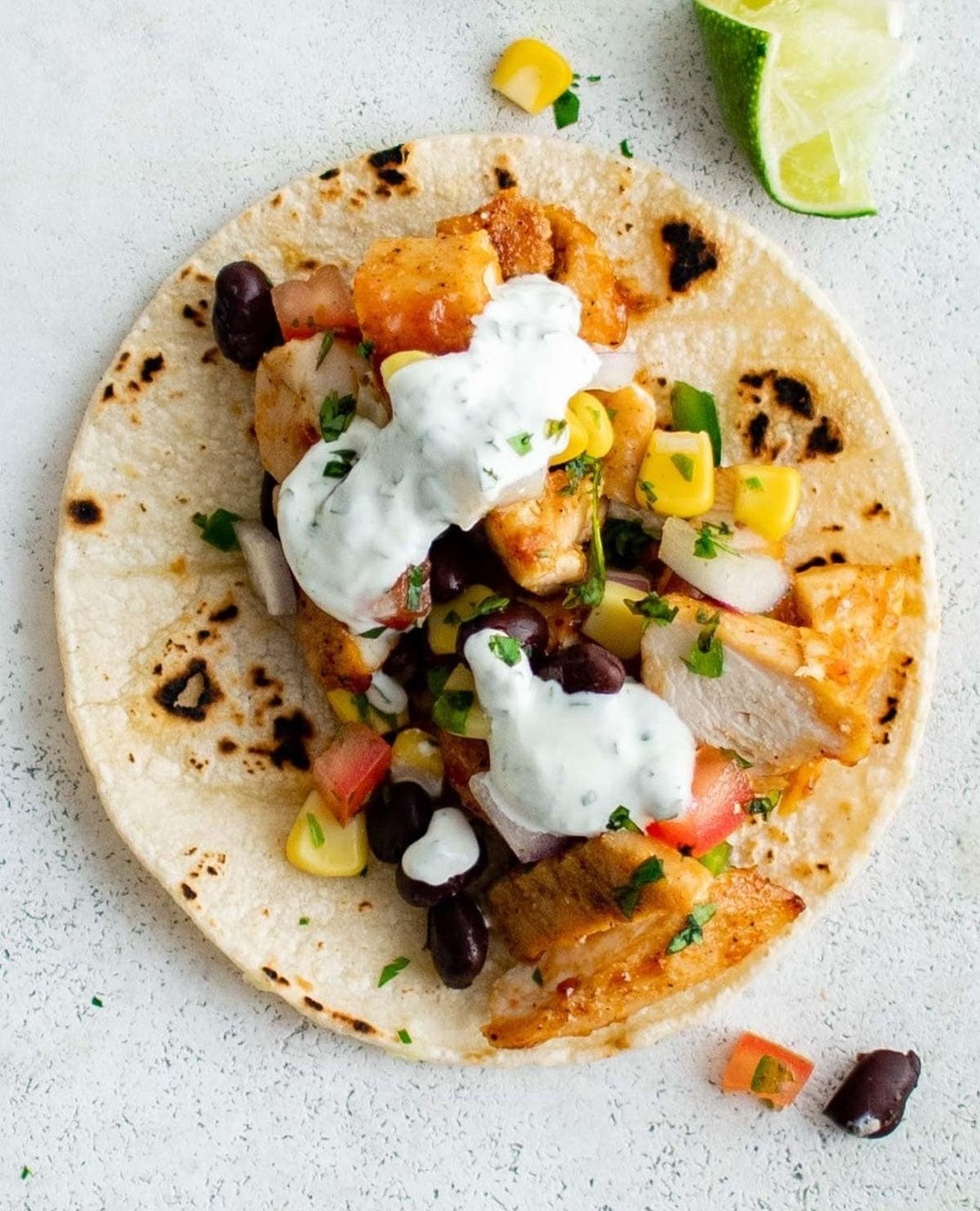 BBQ Chicken Tacos with Black Bean Salsa and Cilantro Lime Crema