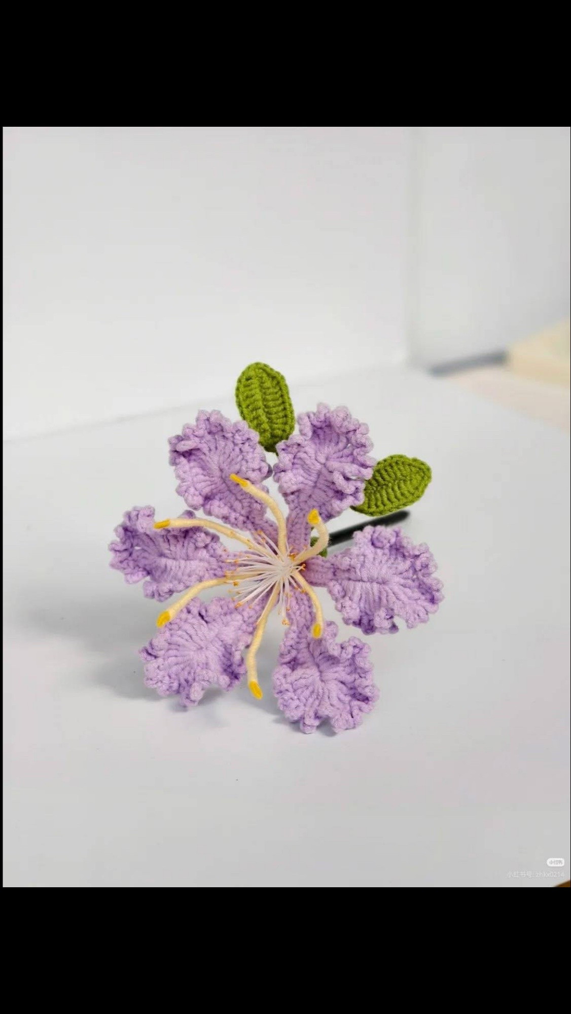 Chart móc len hoa hồng tím.