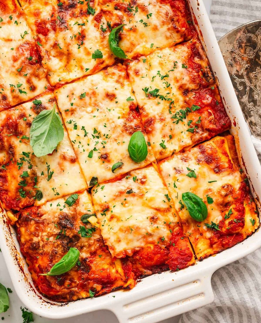 Cheesy Ravioli Lasagna Delight with Marinara Magic
