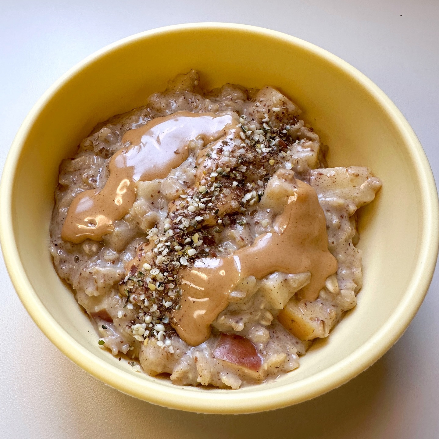 Creamy Cinnamon Apple Oatmeal Delight with Nutty Boost