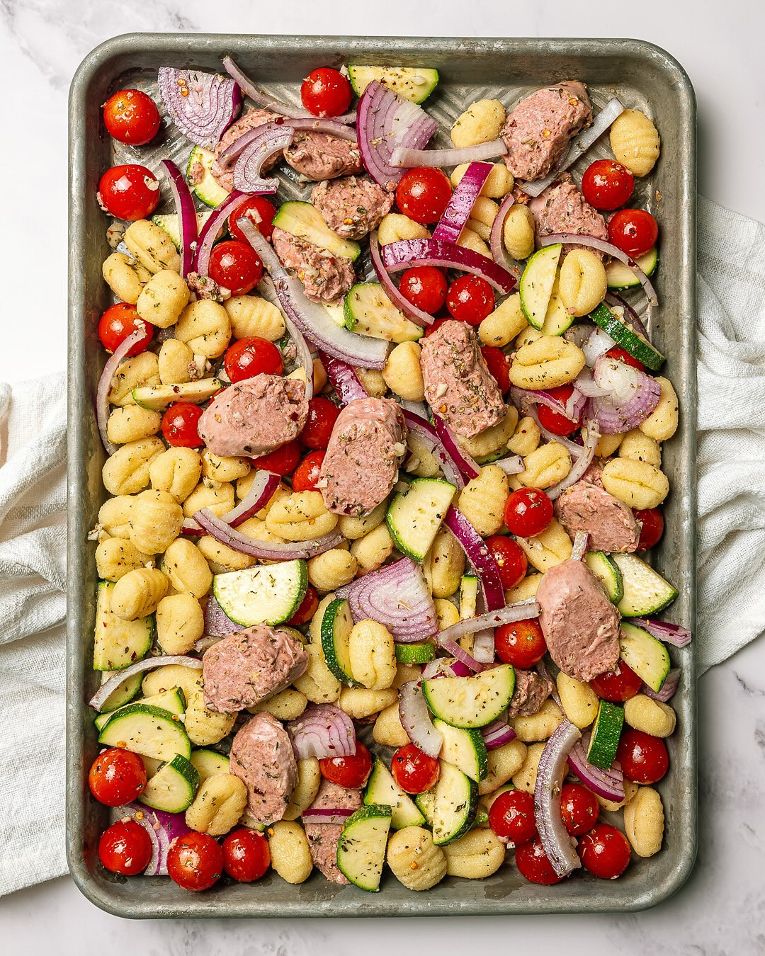 Golden Vegan Gnocchi with Herbed Sausage and Caramelized Vegetables