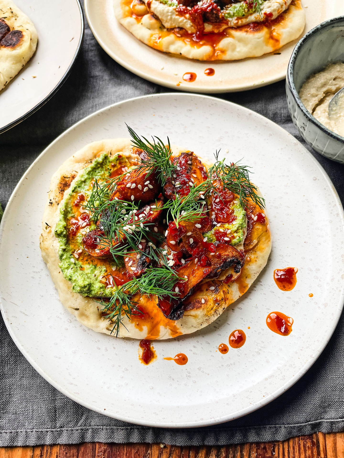 Harissa-Spiced Mushrooms on Za’atar Flatbread with Hummus Delight