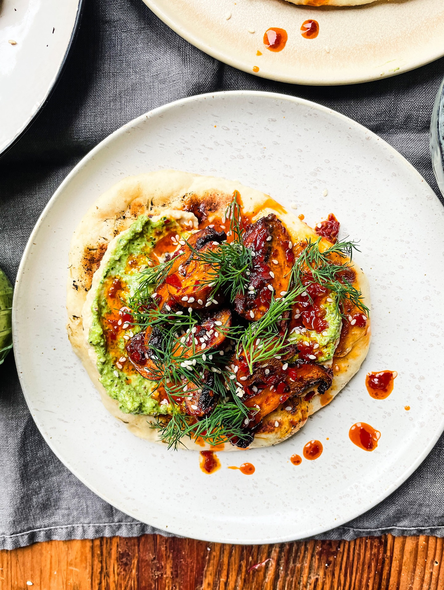 Harissa-Spiced Mushrooms on Za’atar Flatbread with Hummus Delight