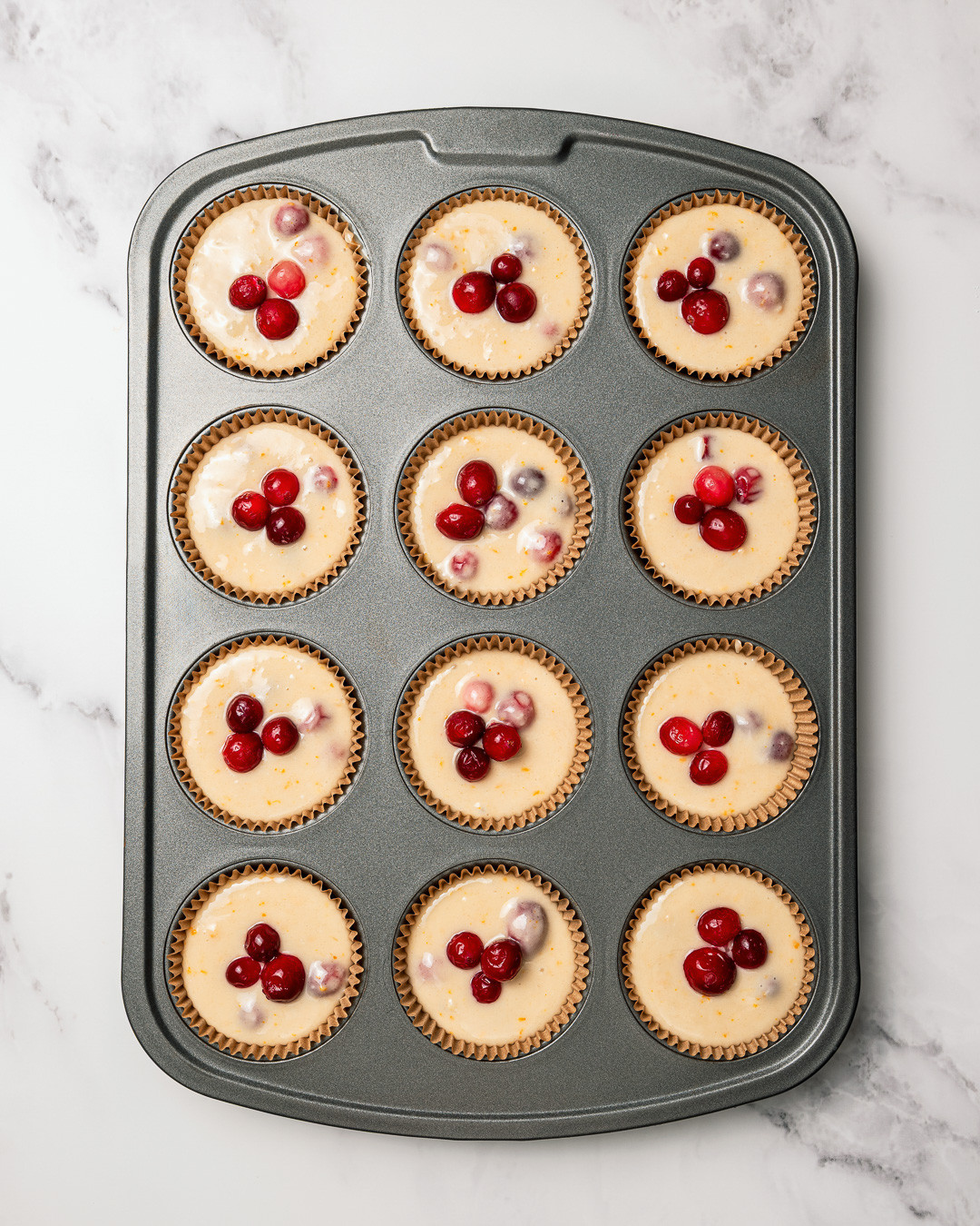 Zesty Cranberry-Orange Muffins with a Citrus Glaze