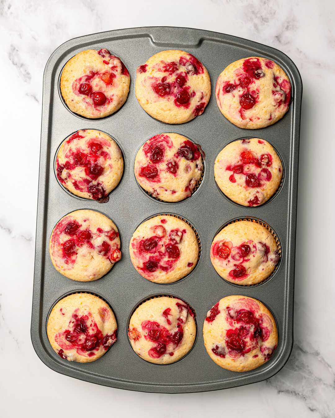 Zesty Cranberry-Orange Muffins with a Citrus Glaze
