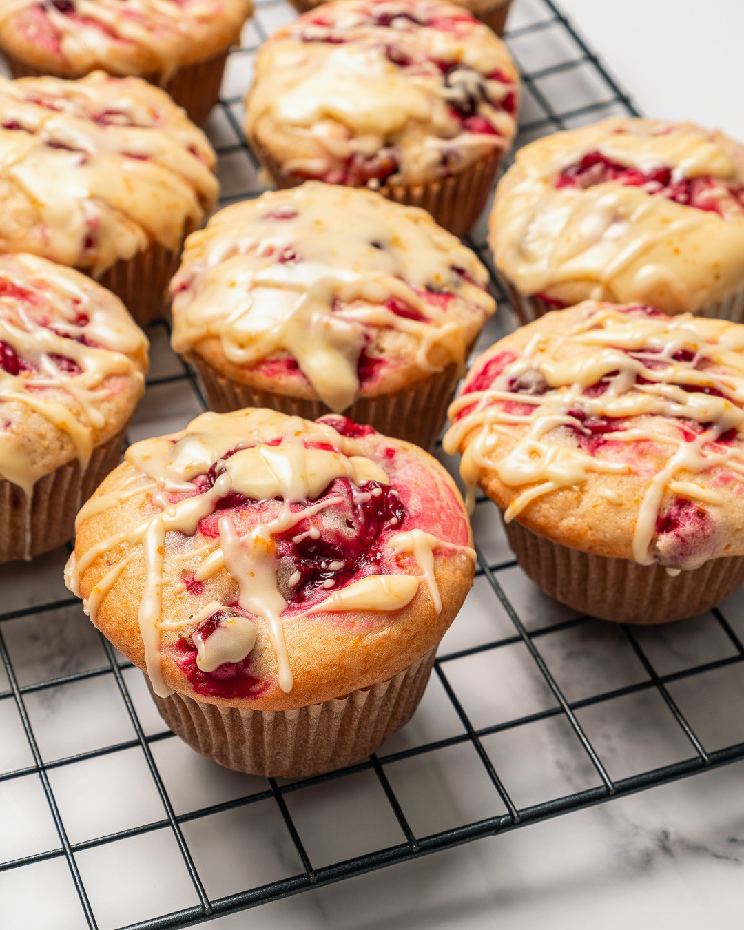 Zesty Cranberry-Orange Muffins with a Citrus Glaze