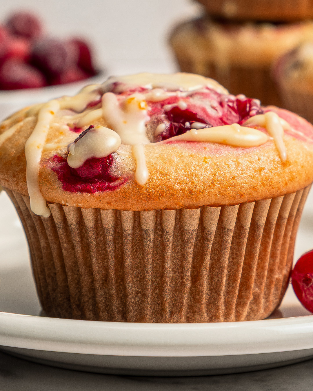 Zesty Cranberry-Orange Muffins with a Citrus Glaze