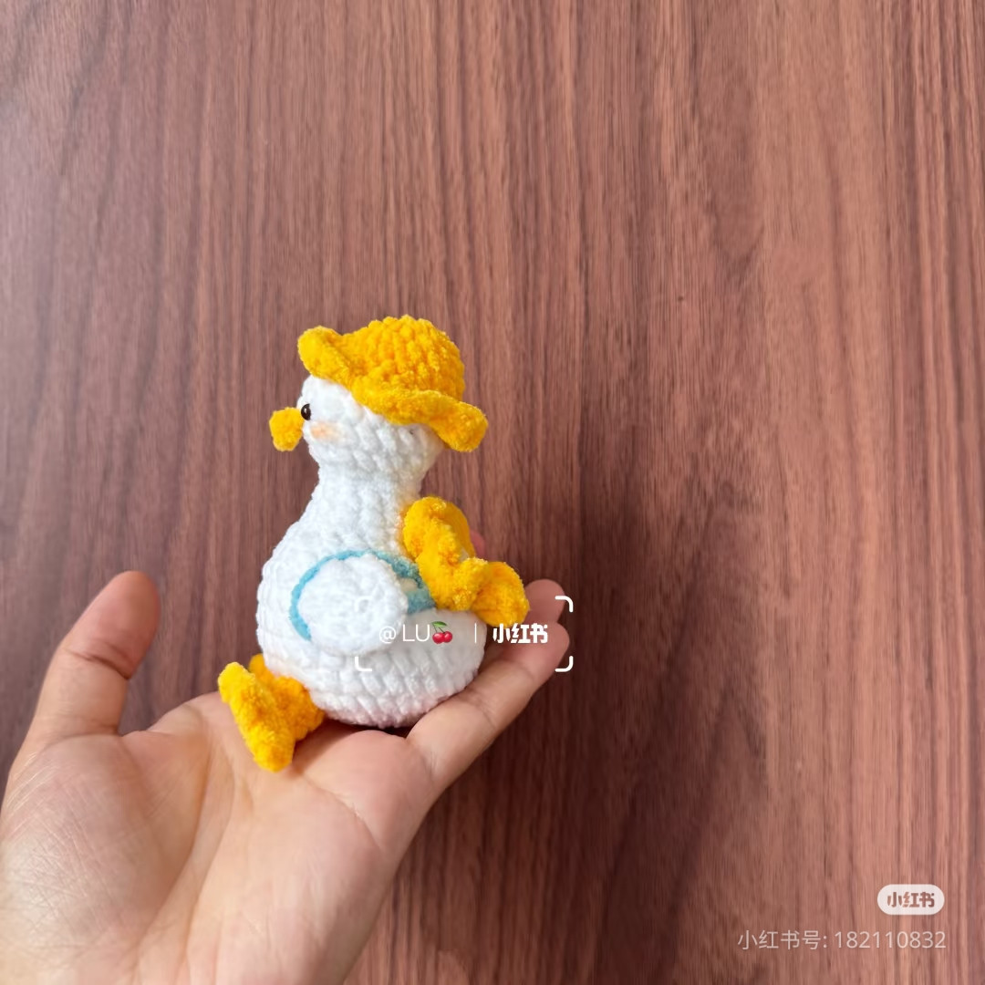 Crochet Duck Pattern with Yellow Yarn and Hat