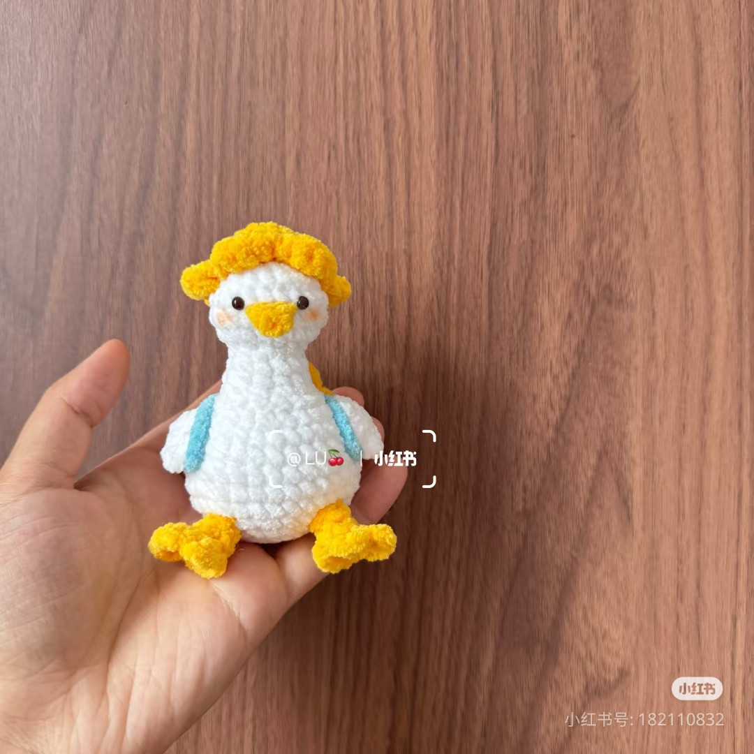 Crochet Duck Pattern with Yellow Yarn and Hat