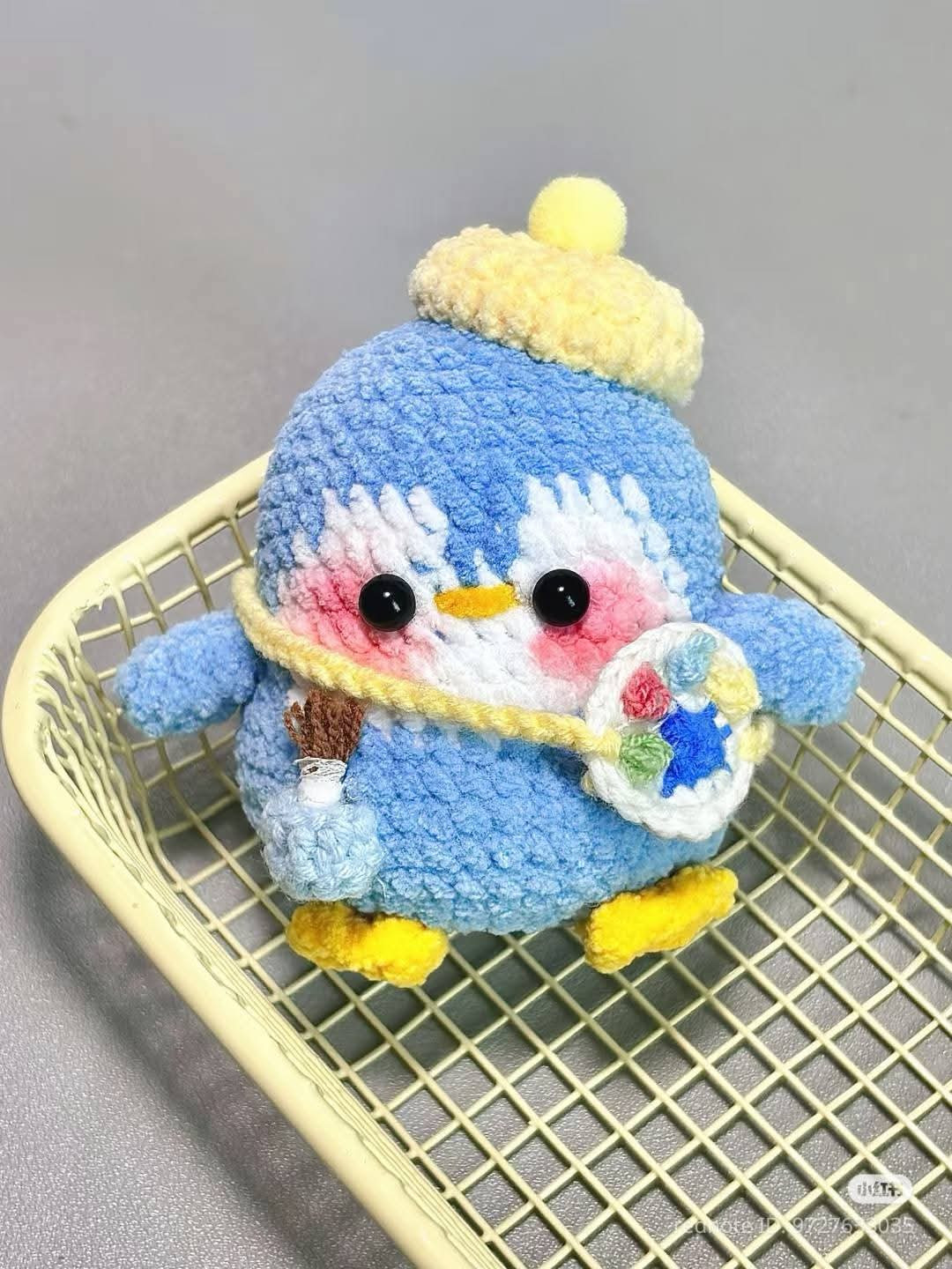 Cute Crochet Penguin Artist with Yarn and Accessories