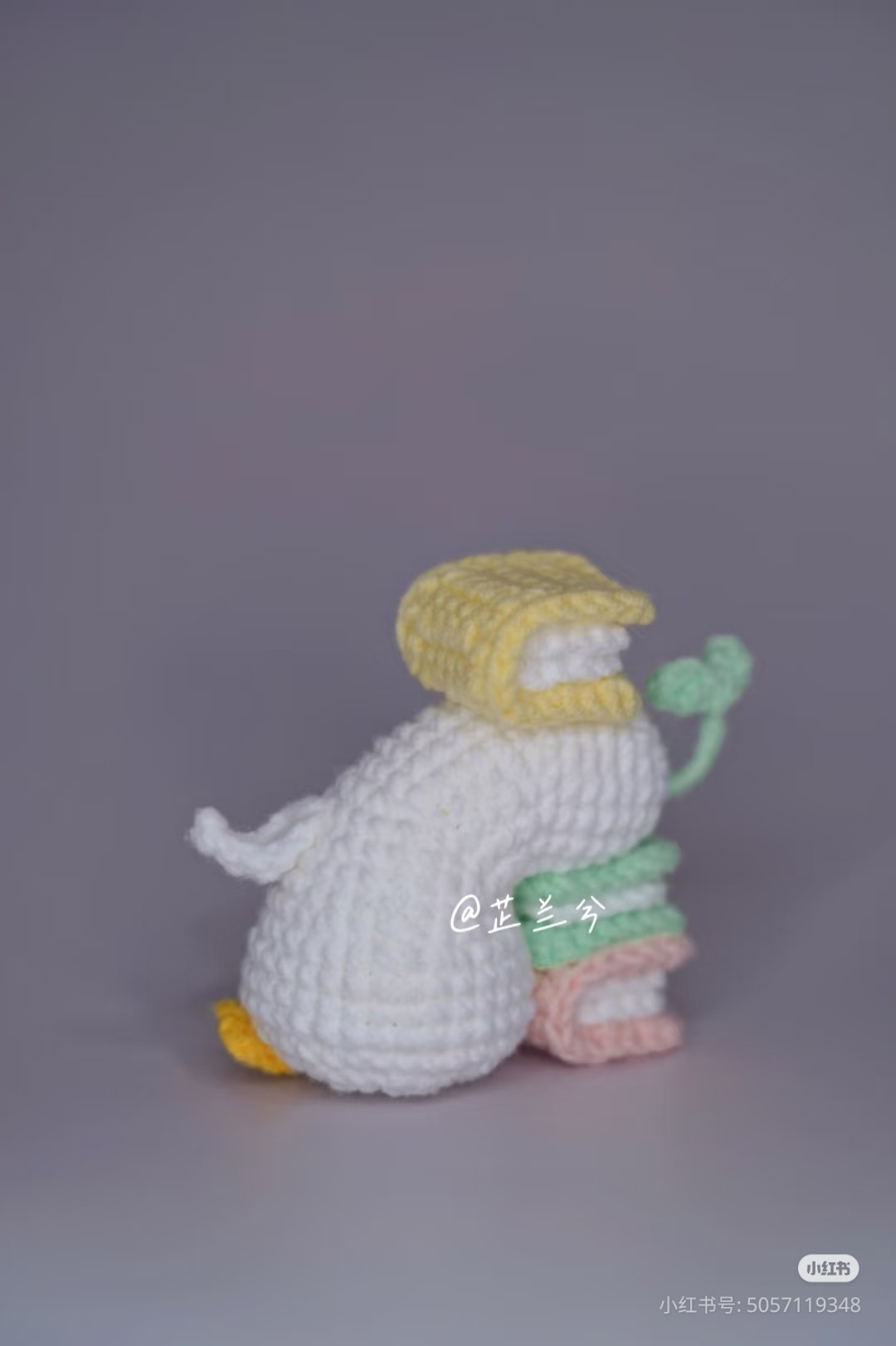 Cute Crocheted Duck with Books by Its Side