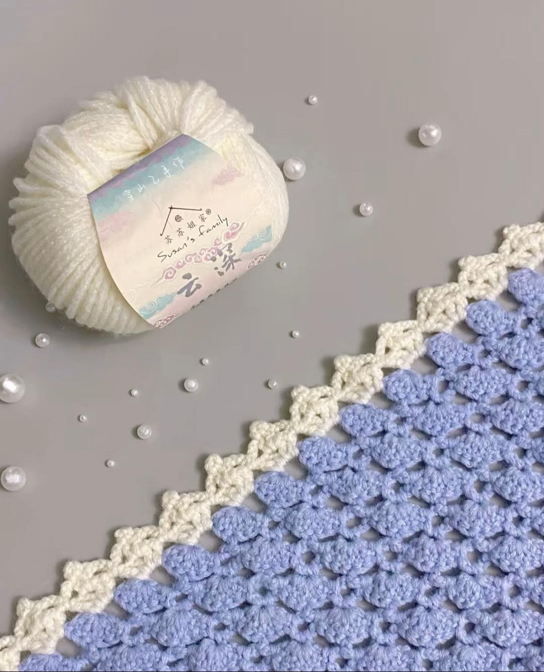 Elegant Crochet Shawl with Shell and Flower Details