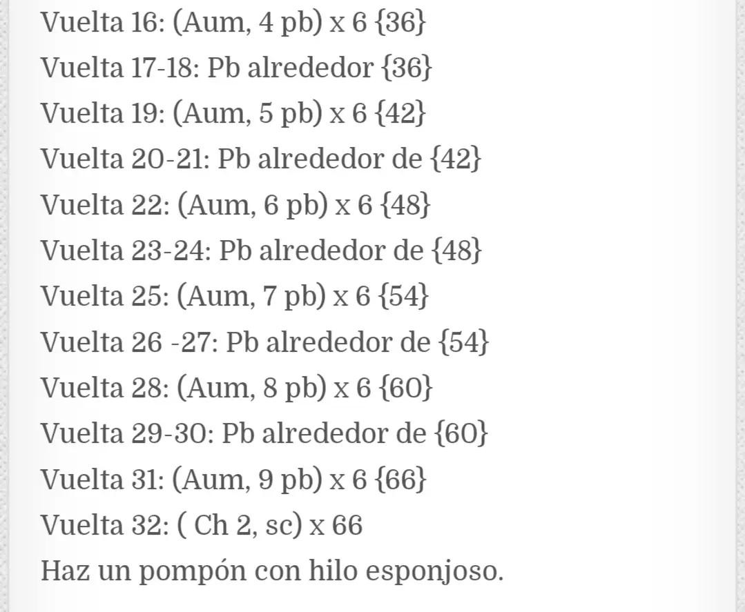 Muñeco de Navidad de ganchillo con regalo en mano