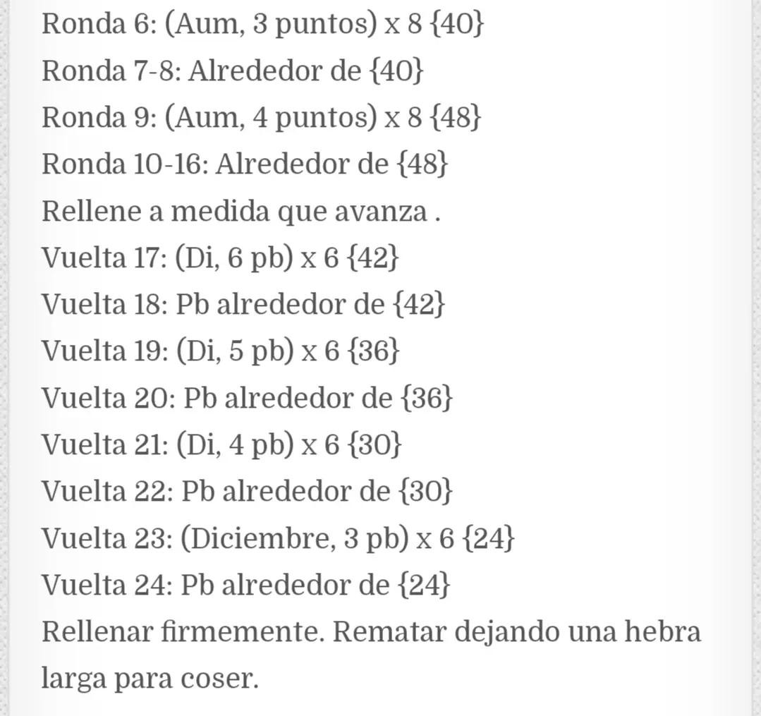 Muñeco de Navidad de ganchillo con regalo en mano