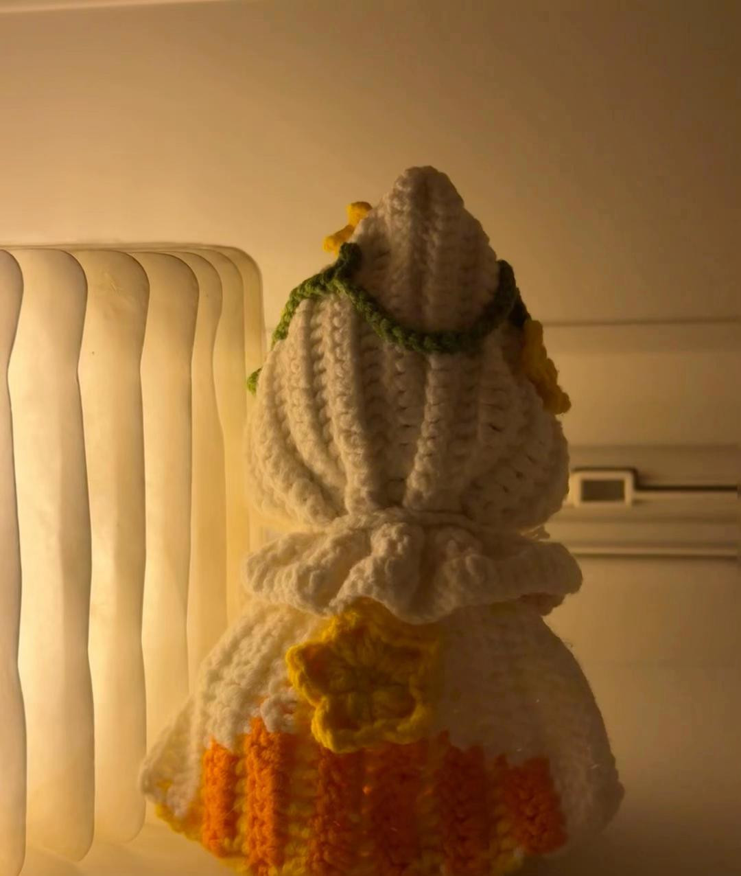 Adorable Crochet Doll with Flower-Embellished Hooded Cape Pattern