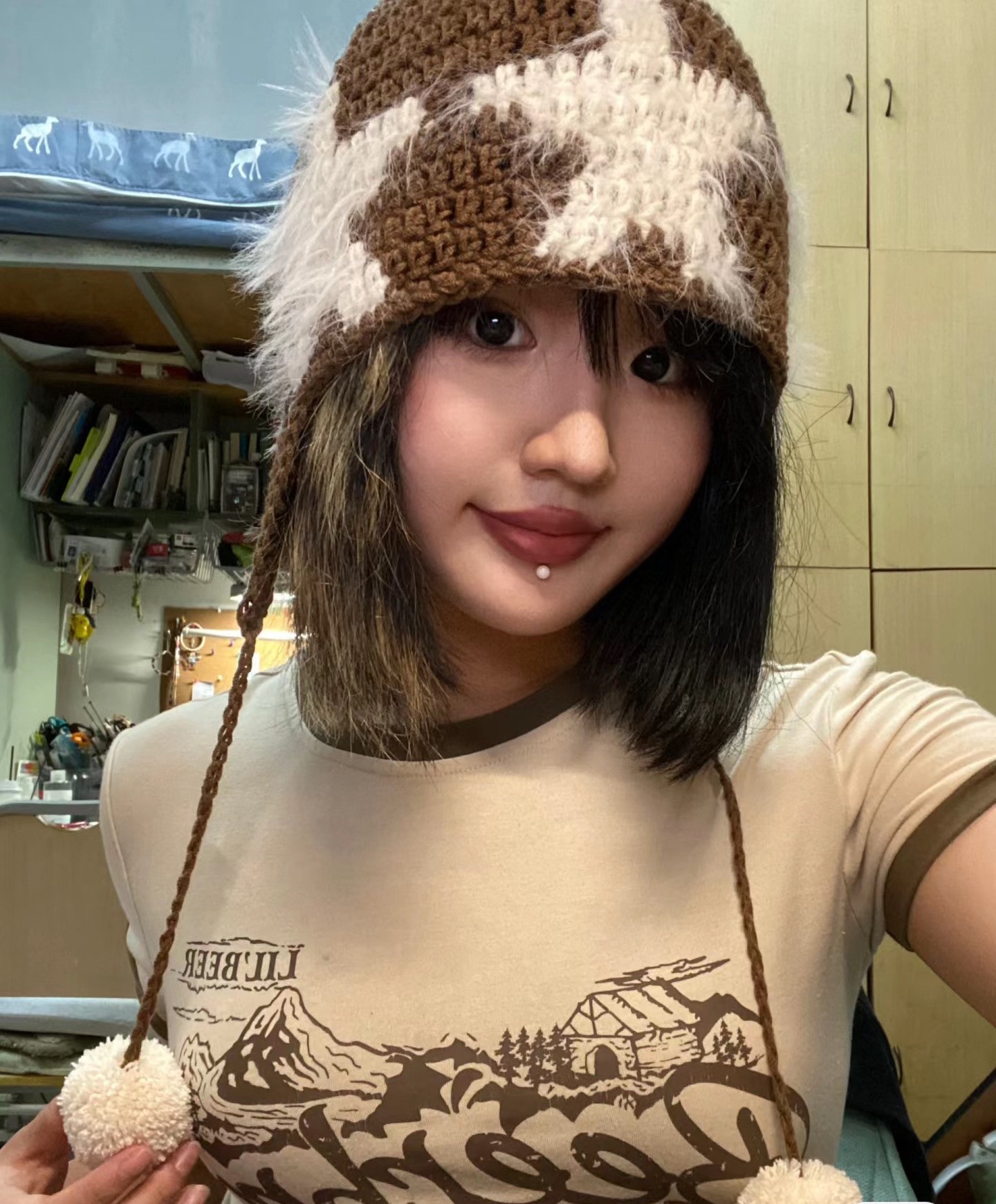 Cozy Star Pattern Crochet Hat with Fluffy Pom-Poms