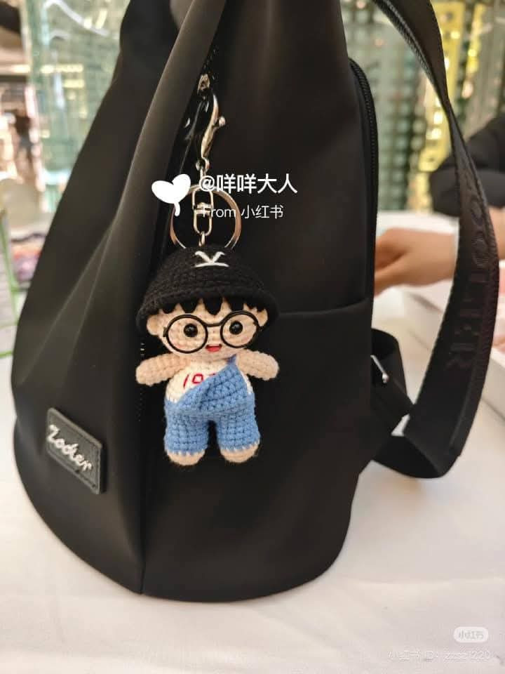 Crochet Amigurumi Doll with Glasses and Blue Overalls