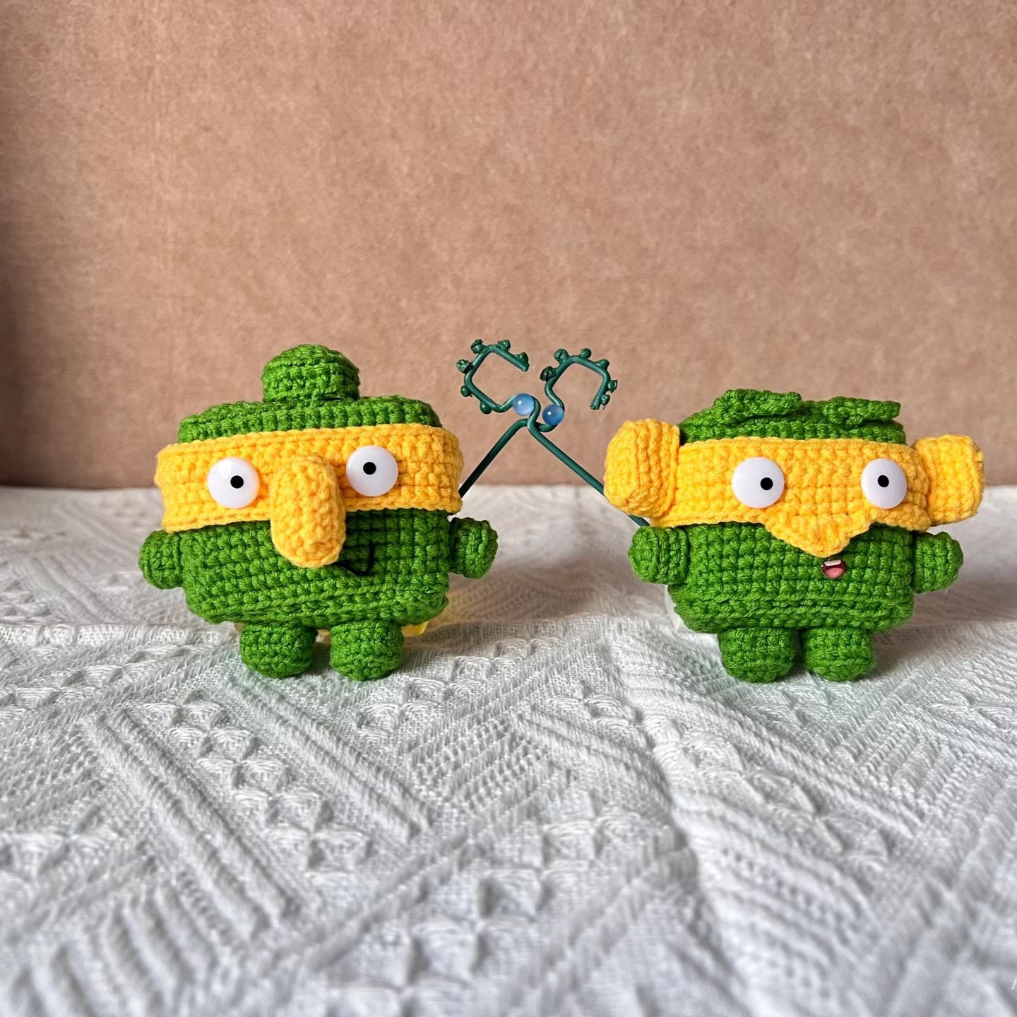 Crochet Green Characters with Yellow Masks and Decorative Scissors