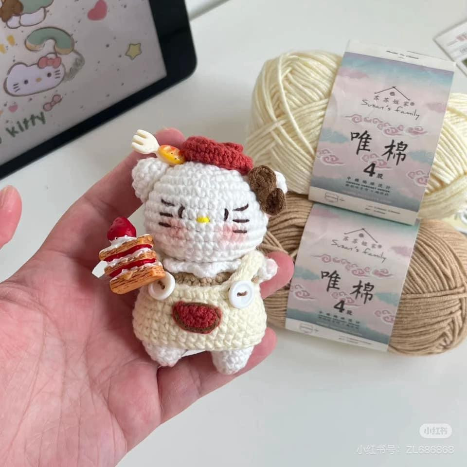 Cute Crochet Animal with Rainbow Outfit and Red Bow