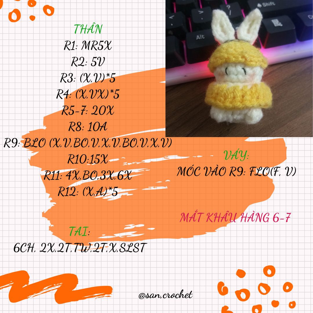 Cute Crochet Bunny in Yellow Outfit on Keyboard