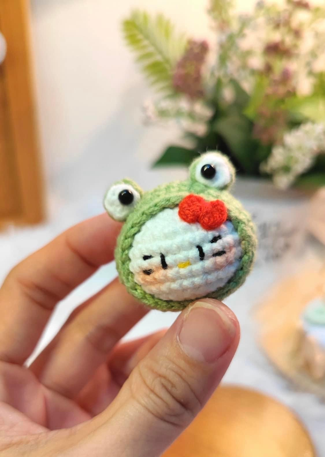 Cute Crochet Cat Face Wrapped in Green Yarn Ball