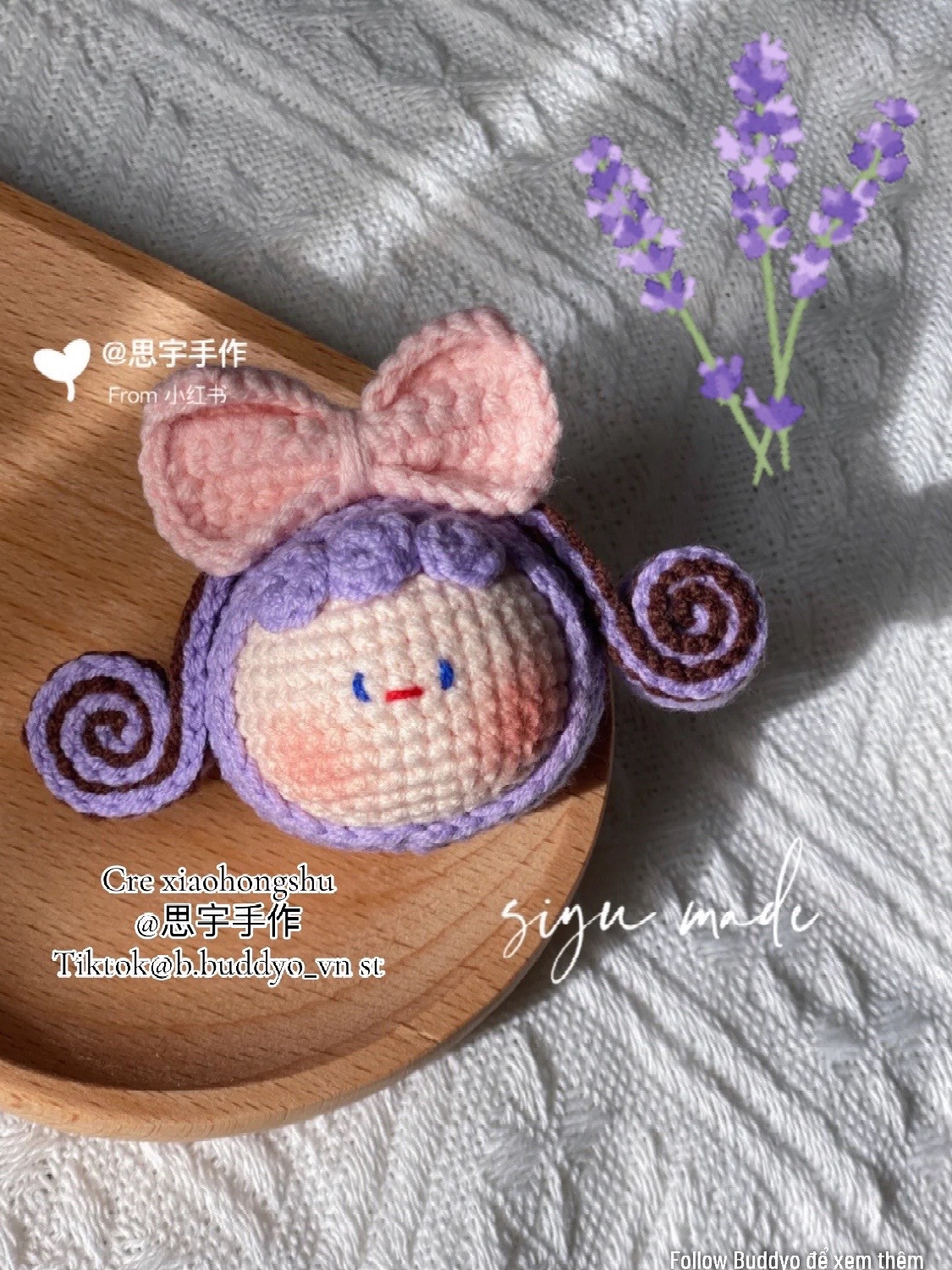 Cute Crochet Doll with Bow and Lavender Background