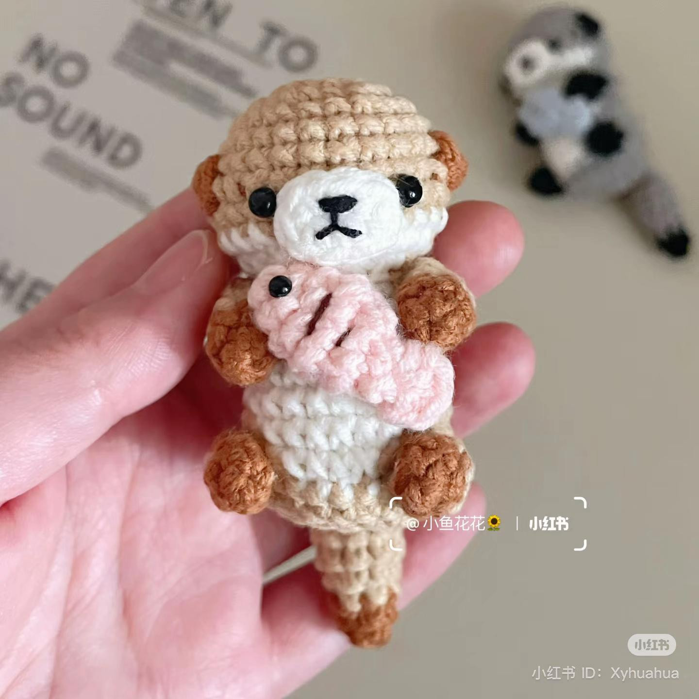 Cute Crochet Otter Holding a Fish Pattern for Amigurumi Lovers