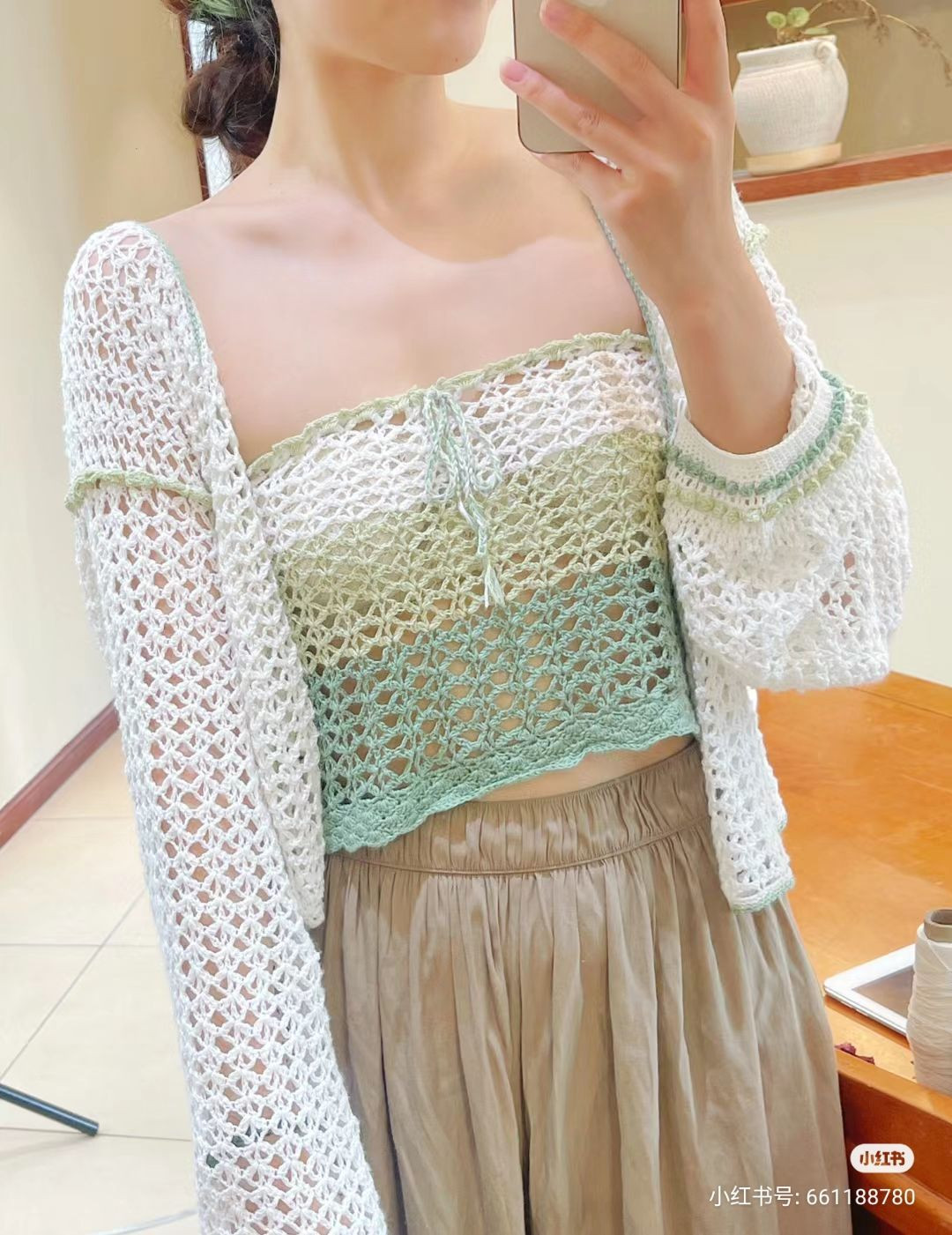 Elegant Crochet Blouse with Pastel Green Accents Design