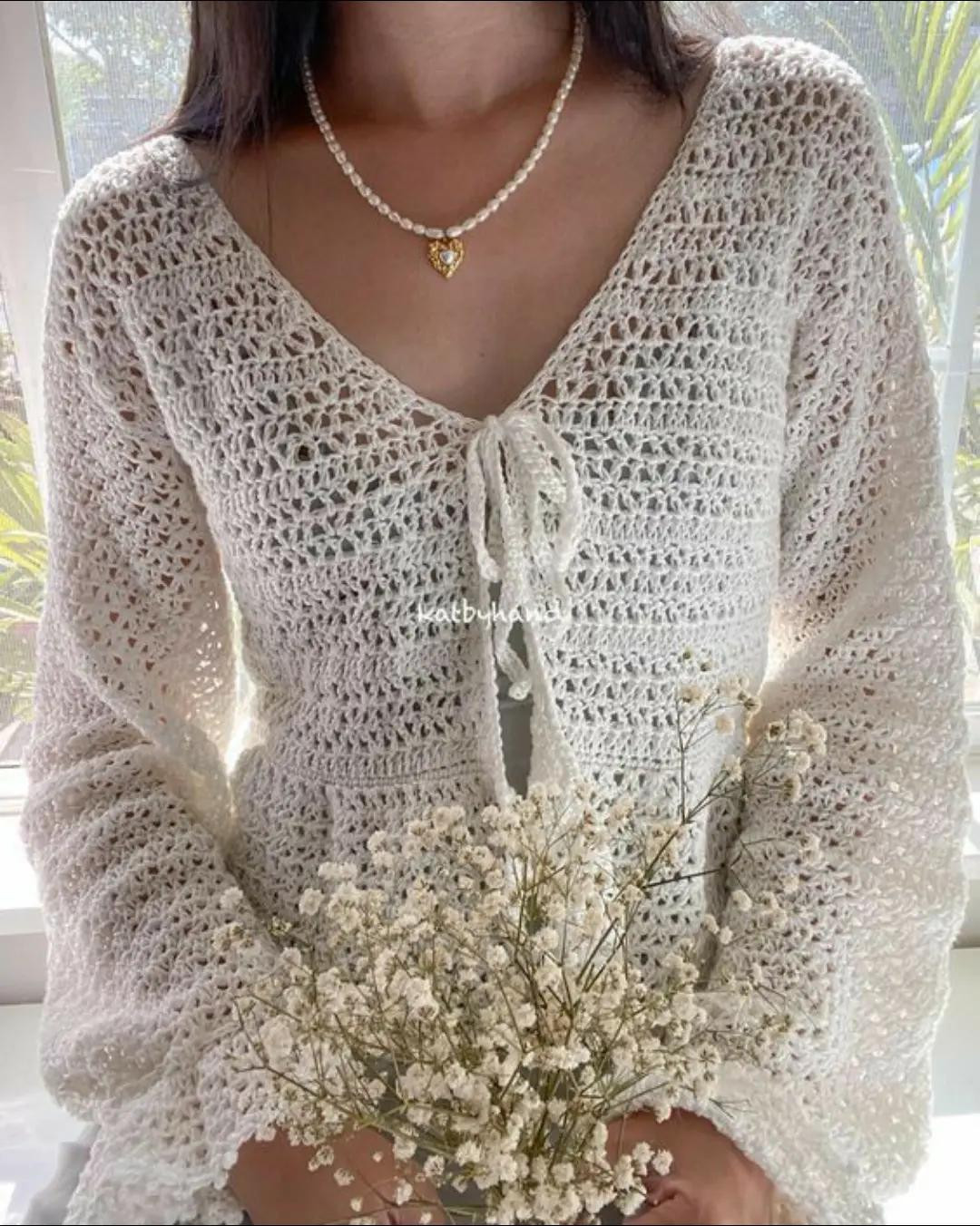 Elegant Crochet Crop Top with Floral Pattern Design