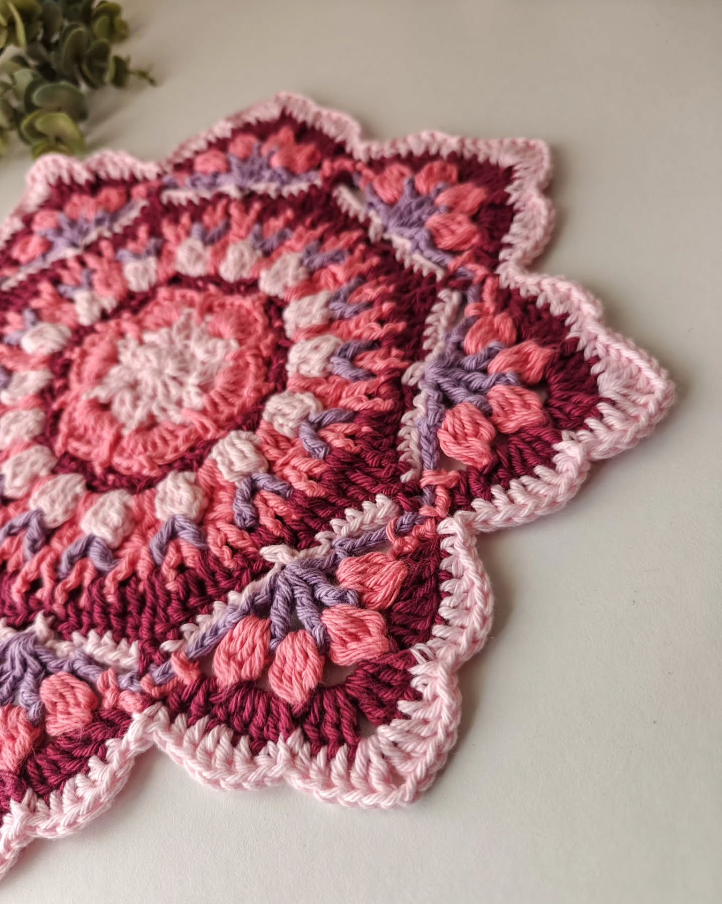 Elegant Floral Crochet Doily Pattern with Pink and Purple Hues