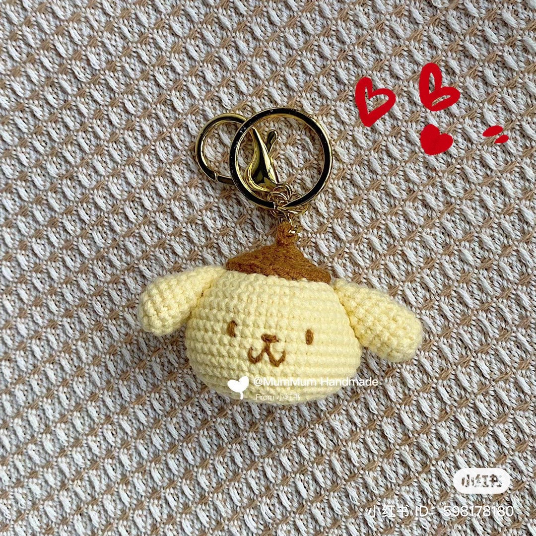 Móc len thú nhồi bông nhỏ xinh hình chú chó dễ thương.