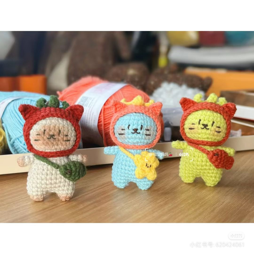 Adorable Crochet Animal Dolls with Colorful Yarn Background