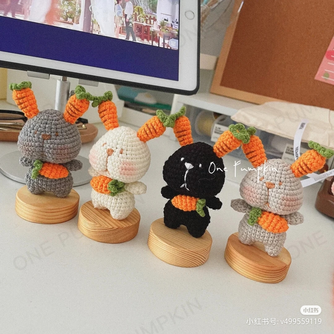 Adorable Crochet Bunnies Holding Carrots in a Woven Basket