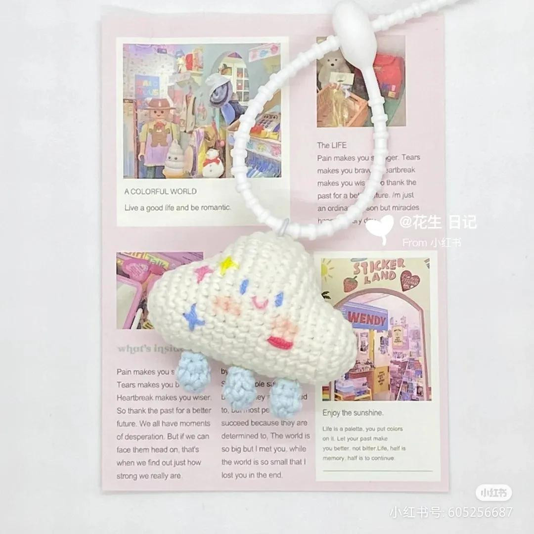 Adorable Crochet Cloud Keychain with Smiling Face and Colorful Details